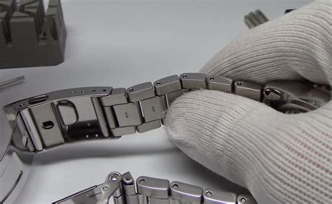 removing citizen watch links|citizen watch band link removal.